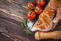 Raw chicken legs on a cutting board on a wooden table Royalty Free Stock Photo