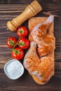 Raw chicken legs on a cutting board on a wooden table. Marinated chicken leg with spices Royalty Free Stock Photo