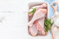 Raw chicken legs, fresh poultry drumsticks on white wooden table Royalty Free Stock Photo