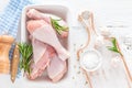 Raw chicken legs, fresh poultry drumsticks on white wooden table Royalty Free Stock Photo