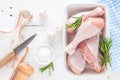 Raw chicken legs, fresh poultry drumsticks on white wooden table Royalty Free Stock Photo