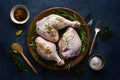 Raw chicken legs seasoned with salt, spices, and herbs Royalty Free Stock Photo