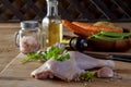 Raw chicken legs with spices and vegetables Royalty Free Stock Photo