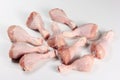 Raw chicken legs with spices on a white background, close-up. chicken drumsticks raw