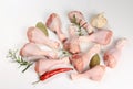 Raw chicken legs with spices on a white background, close-up. chicken drumsticks raw