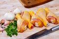 Raw chicken legs on wooden table Royalty Free Stock Photo