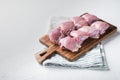 Raw chicken meat on white backgroundwith space for text