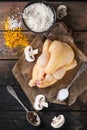 Raw chicken with seasoning and rice