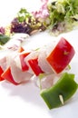 Raw chicken shashlik with pepper