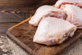 Raw chicken thigh on wooden. Royalty Free Stock Photo