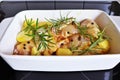 Raw chicken with vegetables prepared for roasting. Royalty Free Stock Photo