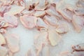 Raw chicken wings on top of ice on sale