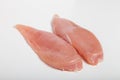 Raw chiken meat on a light background