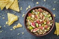 Raw chopped figs, walnuts, pistachios and honey with soft cheese in a bowl