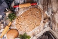 Raw christmas traditional gingerbread cookie. Rustic table top background. Homemade delicious traditional pastries. Top view Royalty Free Stock Photo