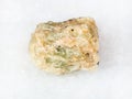 raw chrysoberyl (green beryl) crystal on white Royalty Free Stock Photo