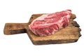 Raw chuck eye roll beef cut boneless with marbled structure isolated on studio white. Beef meat ingredient for searing Royalty Free Stock Photo