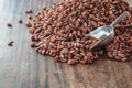 .Raw cocoa beans on a wooden table