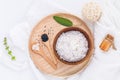 Raw coconut and coconut essential oils with sea salt and herbs. Royalty Free Stock Photo