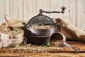 Raw coffee bean still life with roaster