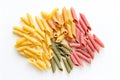 Raw colorful penne pasta isolated on white background. AI generated Royalty Free Stock Photo