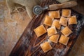 Raw colourful Ravioli with pumpkin and paprika