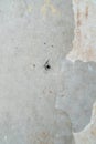 Raw Concrete and Plaster Construction Wall Texture with Screw Royalty Free Stock Photo