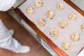 Raw cookie dough on a baking tray with parchment paper Royalty Free Stock Photo