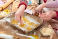 Raw cookies in baking tray, sweet food concept