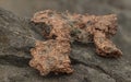 raw copper ore resting on a rock Royalty Free Stock Photo