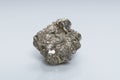 Raw crystalline pyrite iron pyrite, fool's gold . Mineral pyrite from the group of sulfides. The mineral pyrite on a