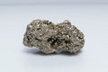 Raw crystalline pyrite iron pyrite, fool's gold . Mineral pyrite from the group of sulfides. The mineral pyrite on a