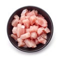 Raw cut meat chunks in black bowl, from above Royalty Free Stock Photo