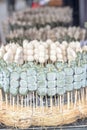 Raw Dango is ready for grill. Dango is a Japaese dumpling and sweet made from mochiko rice flour. related to mochi Royalty Free Stock Photo