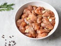 Raw diet marinated turkey meat with garlic, ginger and teriyaki sauce in white bowl. Marinating meat for cooking barbecue