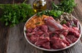 Raw dog food with muscle meat, rumen, bones, liver, vegetables Royalty Free Stock Photo