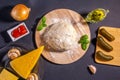 Ingredients for making pizza. dough, pickles, onions, cheese, mushrooms, Basil tomato sauce, garlic. top view flat lay Royalty Free Stock Photo