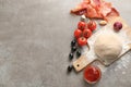 Raw dough with ingredients for pizza on table Royalty Free Stock Photo