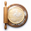 Raw Dough on Wood Cutting Board with Rolling Pin in White Background Royalty Free Stock Photo