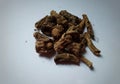 Raw dry and dried Indian Ayurvedic sarsaparilla or Hemidesmus indicus is used for the treatment of psoriasis and skin diseases.