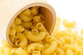Raw dry elbow macaroni. Royalty Free Stock Photo