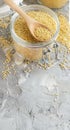 Raw dry hulled millet in a glass jar Royalty Free Stock Photo