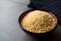 Raw Dry Organic Couscous in a Bowl