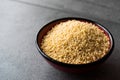 Raw Dry Organic Couscous in a Bowl