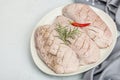 Raw duck breast with fresh spices and herbs, ready to cook food. Domestic cuisine, poultry meat Royalty Free Stock Photo