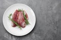 Raw duck breast in white plate Royalty Free Stock Photo
