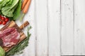 Raw duck breast in white plate and vegetables Royalty Free Stock Photo