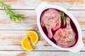 Raw duck legs preparing for roasting marinated in mulled wine Royalty Free Stock Photo