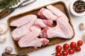 Raw duck wings, on white stone table background, top view flat lay Royalty Free Stock Photo