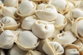 Raw dumplings as background, closeup. Royalty Free Stock Photo